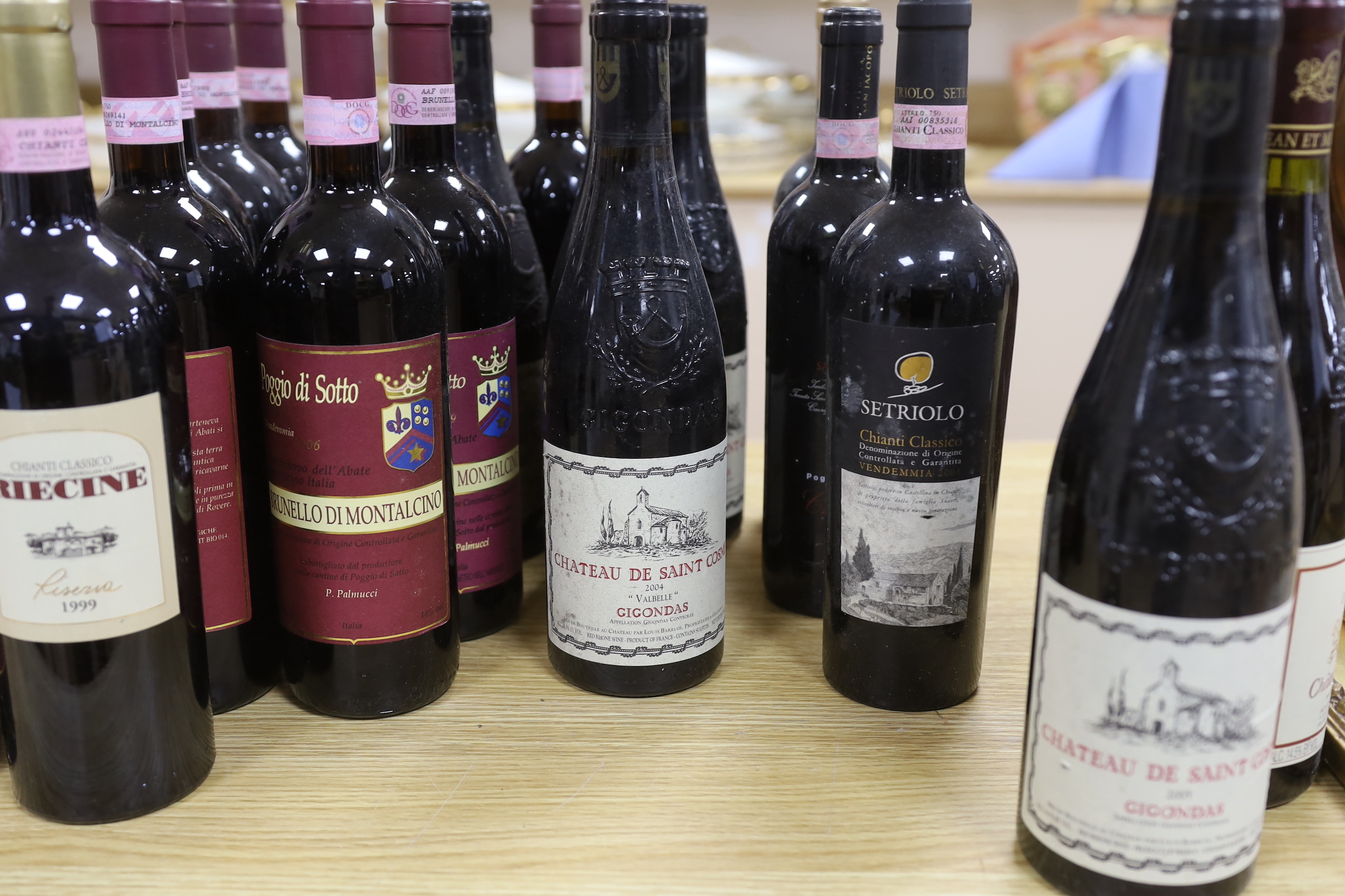 Twenty bottles of red wine including; Chateauneuf-du-Pape 2005, Chateau de Saint Cosme 2005, Chianti 1999, etc.